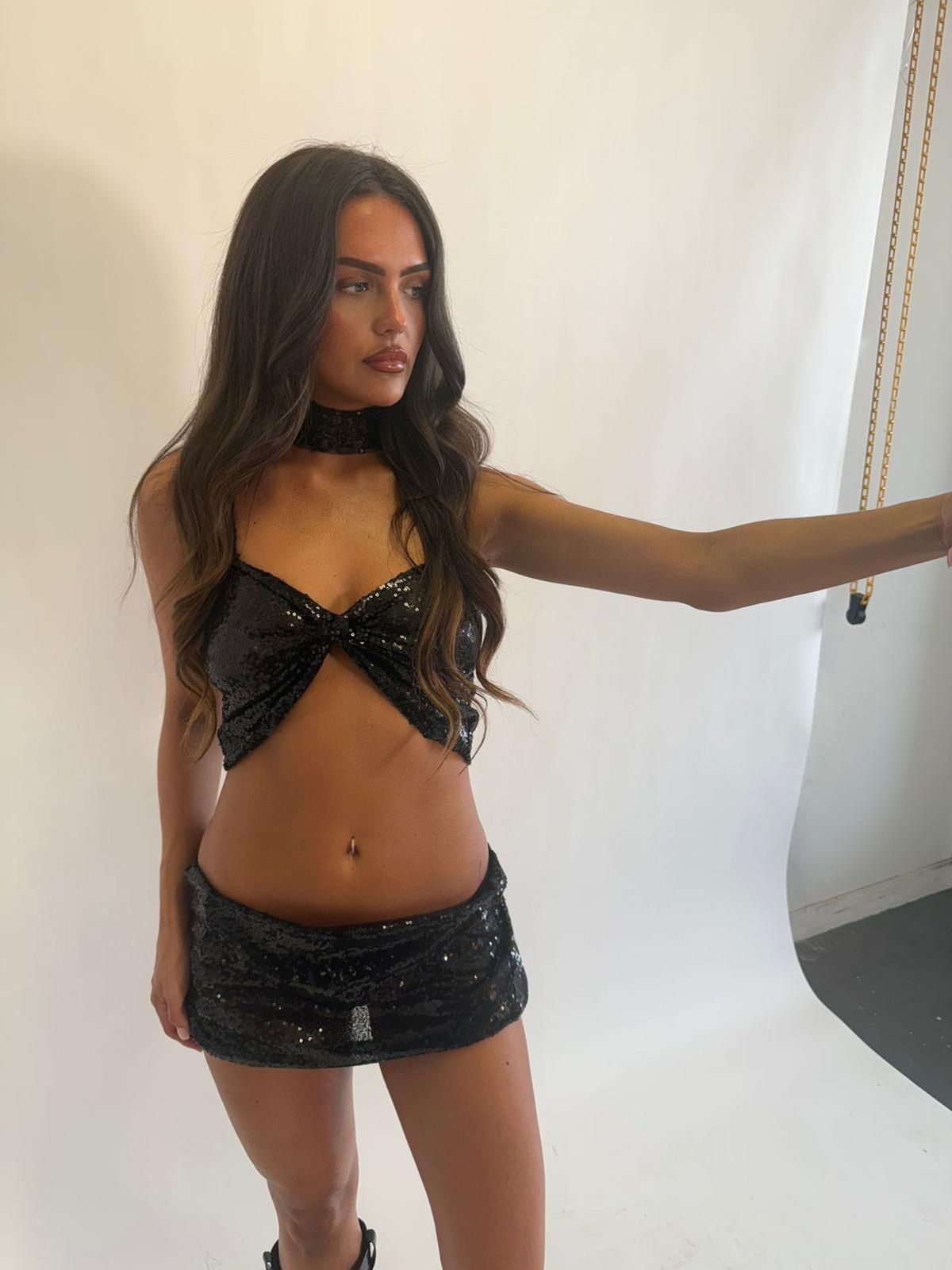 Black sequin mini skirt